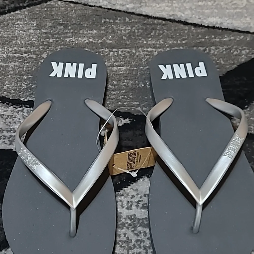 VS PINK BLACK SILVER LOGO FLIP FLOPS SANDALS